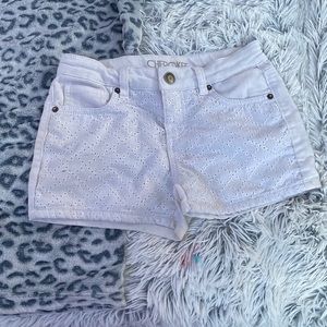 white pleaded shorts